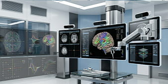 Open neuroscience imaging lab with multiple screens showing brain scans and a colorful 3D brain model on a high-tech workstation.